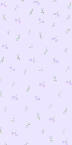 a purple wallpaper with small flowers and leaves on the bottom right corner, in pastel shades