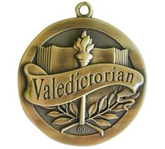 a medal with the word valedictorian on it and an oak branch in the center