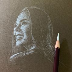 a pencil drawing of a woman's face