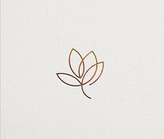 a gold leaf logo on white paper