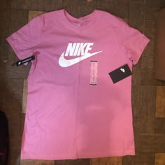 Brand New With Tags Womens Nike Icon Logo Short Sleeve T-Shirt Item Is Brand New And Has Never Been Worn Or Used No Scratches, Scuffs Or Snags Size M Color Pink Back To School List, Rose Quartz Bracelet Beads, Colourful Wallpaper Iphone, Cute Nike Outfits, School List, Bulldog Shirt, House Md, Jordan Shirts, Womens Black Shorts