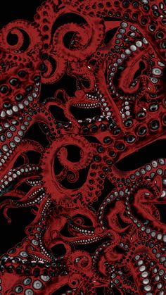 an intricate red and black pattern on a black background with silver circles in the center