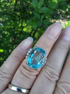 Absolutely Stunning 14k White Gold Diamond Aquamarine ring... Perfect Vintage Pre Owned Condition. Size 5, sizable. Weight 9.05 Grams. Color of Aquamarine is light to Medium blue, in depend on lighting. Aquamarine is about 18mm x 13mm.. Some Pics ENLARGED to see details. check Measurements please. all sales are final. Antique Box for Display Only. Gold and diamonds was tested by jeweler. Luxury Cushion Cut Gemstones For Wedding, Cushion Cut Gemstones With Accent Stones For Formal Occasions, Formal Cushion Cut Gemstones With Accent Stones, Luxury Diamond Gemstones For Wedding, Fine Jewelry Gemstones With Diamond Accents For Wedding, Wedding Fine Jewelry Gemstones With Diamond Accents, Luxury Topaz Ring With Brilliant Cut For Formal Occasions, Exquisite Diamond Topaz Ring For Formal Occasions, Elegant Gemstones With Diamond Accents For Wedding