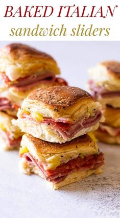 a stack of sandwiches sitting on top of a table