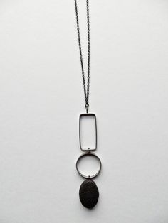 Silver & Stone Necklace - An oval of lava rock is situated beneath cast and fabricated oxidized sterling silver textured shapes.<br><br>Sterling silver chain long enough to slip over the head with no clasp. Wire Wrap Cabochon, Silver Jewlery, Onyx Necklace, Artful Home, Wire Work Jewelry, Work Jewelry, Lava Rock, Geometric Necklace, Art Jewelry