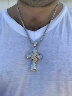 "Men's Custom Made Super Iced Out HEAVY Cross Pendant! Solid 925 sterling silver We have 3 styles! Rhodium finished, two-toned, & 14k yellow gold finished! Color lasts many years!! Measures roughly 2.5\" by 1.5\" ..weighs roughly 25 grams 200 micropaved handset simulated diamonds (CZ) for a total of 3ct! 100% 925 silver...not plated or filled...will NEVER TARNISH OR CHANGE COLOR LISTING IS FOR PENDANT ONLY, CHAIN NOT INCLUDED Bale fits most chains up to 8mm thick!" Fine Jewelry In White Gold With Shiny Finish, White Gold Diamond Jewelry With Shiny Finish, White Gold Cross Pendant With Vvs Clarity, White Gold Pendant Jewelry With Shiny Finish, White Gold Pendant With Shiny Finish, White Gold Shiny Pendant Jewelry, Sterling Silver Cross Jewelry With Diamond Cut, White Gold Cross Pendant With Diamond Cut, Diamond Cut White Gold Cross Pendant Jewelry