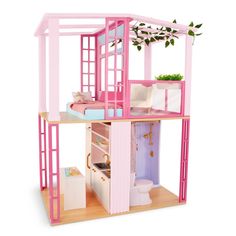 a pink doll house with furniture and accessories on the top floor, in front of a white background