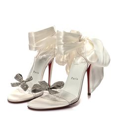 Brand new, genuine Christian Louboutin heels, comes with tags, dustbag and box, perfect for wedding or special occasion! RRP: $3,200.00 Regrettable sale, DM me for inquiries, genuine buyers only. PayPal for secure payment. Christian Louboutin's ivory Astrinodo sandals feature draped satin ankle ties and PVC straps punctuated with crystal-embellished bows, imparting a romantic mood. ASTRINODO 100 -IVORY PVC/CR SATIN/LIN IVORY/LIN WHITE ANKLE WRAP HIGH HEEL SHOE Christian Louboutin Wedding, Christian Louboutin Wedding Shoes, Romantic Mood, Christian Louboutin Heels, Louboutin Heels, Womens Pumps, Ankle Wrap, Womens Heels, Pump Shoes