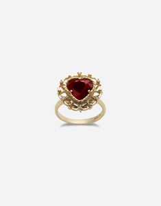 Technical specifications: Gold 18 Kt. Gemstones: 1 heart-shaped red rhodolite garnet, 6 brilliant-cut colourless sapphires. Made in Italy Fine Jewelry Heart Ring With Gemstone For Formal Occasions, Elegant Polished Heart Cut Ring, Formal Heart Cut Ruby Ring In Yellow Gold, Formal Heart Diamond Ring With Gemstone, Formal Diamond Heart Ring With Gemstone, Formal Heart Cut Ruby Ring In Fine Jewelry Style, Formal Yellow Gold Heart Ring With Center Stone, 14k Gold Heart Ring With Gemstone For Formal Occasions, Luxury Formal Heart Ring With Gemstone