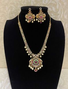 Medium length traditional necklace with earrings Traditional Festive Necklaces With Matching Earrings, Festive Chandbali Necklaces With Matching Earrings, Elegant Chandbali Necklaces With Jewels, Elegant Festive Jewelry Sets With Long Necklace, Costume Jewelry Pendant Necklaces With Matching Earrings, Costume Jewelry Pendant Necklace With Matching Earrings, Traditional Jewelry Sets With Long Necklace For Celebration, Multicolor Hand Set Pendant Necklace, Traditional Long Necklace Jewelry Sets For Celebration