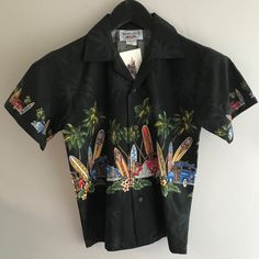 This Nice Black Shirt Is Very Beachy. Casual Black T-shirt With Buttons, Black Button-up Short Sleeve Shirt For Summer, Black Hawaiian Printed T-shirt, Black Button-up Hawaiian Shirt For Beach, Black Summer Shirt With Buttons, Summer Black Shirt With Buttons, Black Buttoned Tops For Vacation, Black Buttoned Summer Shirt, Black Buttoned Shirt For Summer