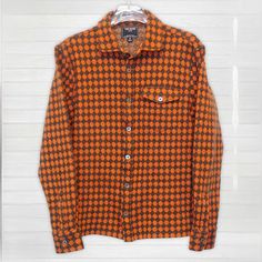 *Perfect Condition, Nwot, Zero Flaws* Brown & Orange Argyle Pattern Knit Over Shirt Featuring Button Chest Pocket As Well As Iridescent Bluish Buttons, By Luxury Brand Todd Snyder. 62% Cotton, 38% Wool Size Labeled M But Fits Like A Small* *All Luxurydrops Items Have Been Carefully Reviewed By A Luxury Industry Expert, Every Item Is Authentic Wool Long Sleeve Shirt For Fall, Long Sleeve Wool Shirt For Fall, Brown Shirt With Lapel Collar For Fall, Fall Wool Tops With Spread Collar, Collared Wool Shirt For Fall, Wool Collared Shirt For Fall, Brown Camp Collar Tops For Fall, Brown Camp Collar Shirt For Fall, Orange Buttoned Tops For Fall