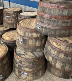 several wooden barrels stacked on top of each other