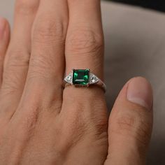 This is a gorgeous handmade creation. Its beauty is its simplicity & Elegance. The 7*7 mm square shape faceted lab emerald is crafted in solid sterling silver and with rhodium plated. All item is sent in a beautiful gift box If you have any idea of design your ring,pls contact me directly. You can realize more lovely stuff clicking the link https://www.etsy.com/shop/knightjewelry?refshopsection_shophome_leftnav Please leave the correct address and you phone number for delivering successfully Classic Princess Cut Emerald Jewelry, Sterling Silver Emerald Ring With Rectangular Stone For Anniversary, Classic Silver Emerald Ring With Rectangular Stone, Anniversary Emerald Ring With Bezel Setting, Silver Emerald Ring With Rectangular Stone For Anniversary, Silver Emerald Ring With Rectangular Stone, Rectangular Solitaire Emerald Jewelry, Emerald Crystal Ring With Emerald Cut, Emerald Solitaire Princess Cut Jewelry