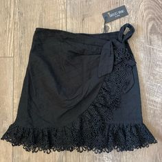 Nwt! From Boutique Isabelles Cabinet Eyelet Ruffle Wrap Mini Skirt. Spring Black Skirt With Lace Trim, Black Skirt With Lace Trim For Spring, Black Lace Trim Skirt For Spring, Black Skirt With Lace Trim For Summer, Lace Ruffled Skirt For The Beach, Lace Ruffled Beach Skirt, Lace Ruffled Skirt For Beach, Black Lace Trim Skirt For Summer, Chic Lace Skirt With Ruffle Hem