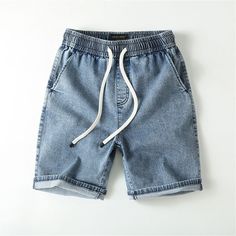 M-130-01 Denim Blue Cotton Jean Shorts With Pockets, Cotton Jean Shorts With Pockets In Denim Blue, Blue Cotton Jean Shorts With Pockets, Denim Blue Cotton Jean Shorts For Spring, Casual Cotton Jean Shorts With Pockets, Denim Jean Shorts With Pockets For Summer, Blue Cotton Jean Shorts For Spring, Blue Cotton Jeans For Summer, Spring Blue Cotton Jean Shorts