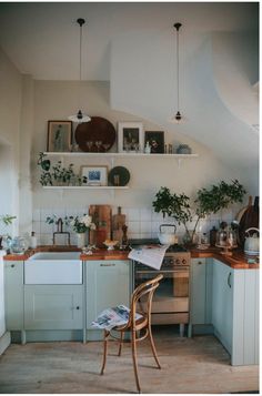 the kitchen is clean and ready for us to use it's stove top oven