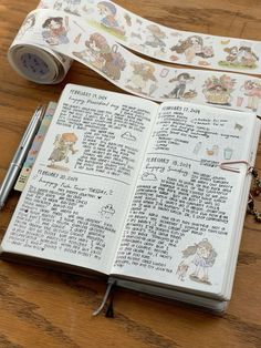 an open bible with stickers on it and a pen sitting next to the book