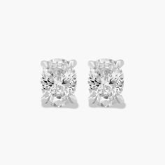 Platinum Oval Shape Diamond Stud Earrings (0.25 CTW - H-I / SI1-SI2). This pair of classic princess cut diamond earrings feature a tapered basket, showcasing the unique characteristics of a princess cut diamond. Linear, chunky flashes of light shimmer though out this dramatic geometric pattern. Oval Brilliant Cut Diamond White Earrings, White Oval Brilliant Cut Diamond Earrings, Silver Lab-grown Diamond Earrings With Vvs Clarity, Valentine's Day Brilliant Cut Diamond Earrings In Sterling Silver, Macy's Brilliant Cut Diamond White Earrings, Princess Cut Diamond Earrings, Classic Cushions, Shimmer And Shine, Shimmer N Shine