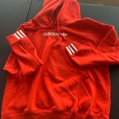 Adidas Hoodie- New Never Worn. Adidas Hoodie With Three Stripes, Adidas Three Stripes Hoodie Sweatshirt, Adidas Hoodie Sweatshirt With Three Stripes, Fall Sportswear Hoodie With Three Stripes Branding, Adidas Hoodie With Ribbed Cuffs For Sports Season, Adidas Hoodie With Three Stripes For Sports Season, Fleece Hoodie With Three Stripes For Streetwear, Red Fleece Hoodie With Double-lined Hood, Sporty Red Sweatshirt With Kangaroo Pocket