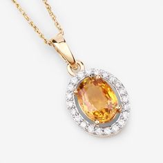 14K Gold Yellow Sapphire Pendant, Genuine Yellow Sapphire and Diamond Pendant Necklace, September Birthstone, Bridal Sapphire Pendant Bright, beautiful colors make this halo pendant into a one-of-a-kind statement piece you'll love. Our 1.78 ct. t.w. oval genuine yellow sapphire pendant necklace is set in polished fine finish 14k yellow gold for a divine look at a smart price. Yellow sapphire is a stunning gemstone that has a deep and rich yellow color. It is also very durable and resistant to sc Yellow Gold Pendant Jewelry With Accent Stones, Dazzling Pendant Jewelry With Gemstone Accents, Yellow Gold Oval Necklace With Accent Stones, Fine Jewelry Citrine Necklace With Round Pendant, Fine Jewelry Citrine Round Pendant Necklace, Oval Yellow Gold Necklace With Accent Stones, Oval Necklace With Accent Stones In Fine Jewelry Style, Oval Fine Jewelry Necklace With Accent Stones, Oval Necklace With Accent Stones