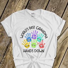 a t - shirt with the words world's best grandma hands down on it