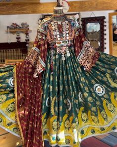 Beautiful Afghan chirma embroidered dress. Its fabric is banaras , this dress is for wedding and nekah Maxi Length Gown With Pallu For Traditional Ceremonies, Bollywood Style Dresses With Zari Work In Traditional Drape, Bollywood Style Dress With Zari Work And Traditional Drape, Bollywood Style Dresses With Zari Work, Bollywood Brocade Eid Dress, Bollywood Dresses With Zari Work And Traditional Drape, Bollywood Brocade Dress For Eid, Fitted Chanderi Dress For Traditional Ceremonies, Intricately Embroidered Gown For Traditional Ceremonies And Navratri