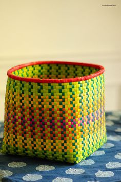 a colorful basket sitting on top of a table