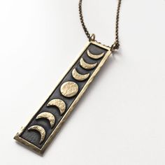 Mystical Sun And Moon Brass Jewelry, Spiritual Brass Moon Phase Necklace, Mystical Brass Jewelry With Sun And Moon Design, Spiritual Brass Necklace With Moon Phase, Celestial Metal Moon Phase Necklace, Celestial Metal Necklace With Moon Phase, Bohemian Brass Moon Phase Necklace, Celestial Moon Phase Brass Necklace, Celestial Brass Moon Phase Necklace