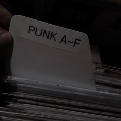 a stack of papers with the words punk af on them