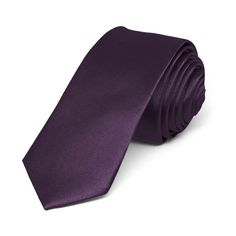 This eggplant purple solid color skinny tie is part of our trendiest line of neckties. It features a 2-inch width, just like what all the young celebrities are wearing. A satin finish provides an extra sharp look.We recommend this shade for a muted deep purple color. Product Features • Skinny 2" width, at the widest point • 57" length, tip to tip• Color is eggplant purple • Made from 100% Polyester • Satin finish • Dry clean only • Imported Purple Standard Tie For Black Tie Events, Purple Fitted Suit And Tie Accessories For Groom, Fitted Purple Tie For Groom, Elegant Purple Suit And Tie Accessories For Groom, Classic Purple Adjustable Suit And Tie Accessories, Elegant Purple Ties For Groom, Elegant Purple Wedding Ties, Formal Lavender Fitted Suit And Tie Accessories, Dark Blue Solid Color