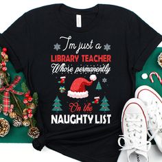 Library Teacher Christmas Shirt, Library Teacher Christmas Gift, Library Teacher Christmas Tshirt, Library Teacher Christmas Tee, Xmas Tee ❤️ This Library Teacher shirt is the perfect gift for Christmas!🎄 𝑾𝒉𝒚 𝒕𝒐 𝒄𝒉𝒐𝒐𝒔𝒆 𝒖𝒔? 👉𝐅𝐚𝐬𝐭 𝐬𝐡𝐢𝐩𝐩𝐩𝐢𝐧𝐠 👉𝐇𝐢𝐠𝐡 𝐪𝐮𝐚𝐥𝐢𝐭𝐲 𝐡𝐚𝐧𝐝𝐦𝐚𝐝𝐞 𝐩𝐫𝐨𝐝𝐮𝐜𝐭𝐬 👉𝐆𝐫𝐞𝐚𝐭 𝐜𝐮𝐬𝐭𝐨𝐦𝐞𝐫 𝐬𝐞𝐫𝐯𝐢𝐜𝐞 - 𝐲𝐨𝐮𝐫 𝐫𝐞𝐪𝐮𝐞𝐬𝐭/𝐪𝐮𝐞𝐬𝐭𝐢𝐨𝐧/𝐩𝐫𝐨𝐛𝐥𝐞𝐦 𝐢𝐬 𝐨𝐮𝐫 𝐩𝐫𝐢𝐨𝐫𝐢𝐭𝐲 👉𝐇𝐮𝐧𝐝𝐫𝐞𝐝𝐬 𝐨𝐟 𝐬𝐚𝐭𝐢𝐬𝐟𝐢𝐞? Legal Assistant, Dental Shirts, Graphic Fashion, Christmas Tshirt, Bella Canvas Tees, Christmas Tees, Christmas T Shirt, Gift For Christmas, Zumba