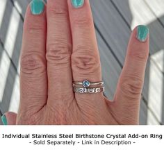 "PLEASE READ THE WHOLE DESCRIPTION BEFORE ORDERING - Custom orders are not returnable. This line of stainless steel rings (sizes 5-11) are hand stamped one metal stamp at a time using the name or initials of your choice (on the outside of the ring only)! Stamping pushes into the metal creating divots that are then filled with black paint. This is a different method than engraving. Since hand stamping is handmade, it won't be completely straight or some letters might be deeper than others; if tha Personalized Stackable Rings, Birthstone Band, Ring For Mom, Stackable Birthstone Rings, Birthstone Stacking Rings, One Finger, Ring Spacer, Mom Ring, Birthstone Rings