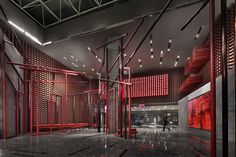 the interior of a building with red and black accents on the walls, floors, and ceiling