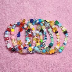 ♥ Please note Due to their handmade nature, these accessories will vary from piece to piece. I take artistic liberties with each bracelet and these designs are randomized, so you may not receive EXACT bead pattern as the listing photo. Same color pallets will be used. What does this mean?: https://www.instagram.com/p/CuzcjNUL1wb/ ♥ Sizing To know which length to choose, measure around your wrist with a tape measure. I'd recommend rounding UP to the nearest inch to ensure a comfortable fit. If yo Customized Multicolor Casual Jewelry, Casual Customized Multicolor Jewelry, Personalized Multicolor Beaded Bangle Bracelets, Trendy Handmade Multicolor Beaded Bracelets, Casual Handmade Assorted Stretch Bracelet, Handmade Adjustable Artsy Beaded Bracelets, Handmade Artsy Adjustable Beaded Bracelets, Handmade Mixed Beaded Bracelets As Gift, Handmade Mixed Color Beaded Bracelets For Gift