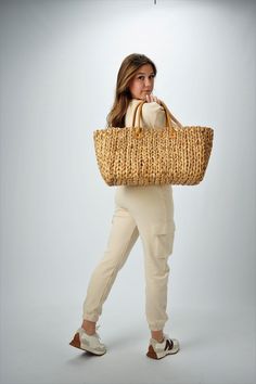 This extra large straw tote is woven from natural hyacinth and has two over-sized leather handles for carrying everything from beach gear to vintage finds. Neutral, classic and spacious, it can do it all. Content:- Hyacinth Straw - Leather- Linen Lining- Imported Size:- Width: 18.5" - Height: 11.25"- Depth: 9"- Handle Drop: 7.5" Accessories Board, Woven Bags, Straw Tote Bag, Beach Gear, Straw Bags, Straw Tote, Straw Hats, Tote Bag Leather, Beach Bags