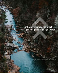 a river flowing through a forest filled with lots of rocks and trees next to a quote that reads, it home is where the heart is when my heart is