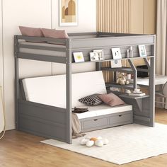 there is a bunk bed with a desk underneath it and drawers under the bottom shelf