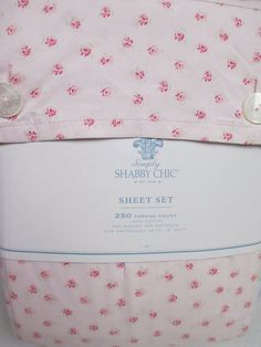 a pink sheet set with flowers on it