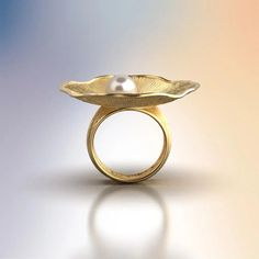 Discover the allure of our Pearl and Diamond Ring, a masterpiece of Italian craftsmanship. This exquisite ring features an 8mm Akoya White Pearl set in your choice of 14k or 18k solid gold—available in yellow, white, or rose gold. Complemented by a 0.1 Ct natural diamond, this ring is a perfect blend of sophistication and timeless beauty. Handcrafted in Vicenza, Italy, this ring embodies the finest traditions of Italian jewelry making. Its organic design, inspired by nature, adds a unique touch Design Inspired By Nature, Vicenza Italy, Pearl And Diamond Ring, Jeweled Earrings, Italian Craftsmanship, Italian Jewelry, Organic Design, Pearl Set, Sea Pearls