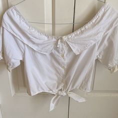 This Is A Nwt, All White Cotton Button Down Crop Top With Wide Collar And Tails To Tie Up. Casual Cotton Blouse With Cute Collar, Casual Cotton Blouse With Decorative Collar, Casual White Blouse With Cute Collar, White Casual Blouse With Cute Collar, White Cotton Blouse With Cute Collar, White Button-up Tops With Buttons, Casual White Tops With Cute Collar, Cute Tops With Button Closure For Spring, Cotton Tops With Cute Collar For Daywear