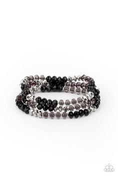 Infused with faceted silver beads, a glamorous collection of sparkly black crystals and smoky beads are threaded along stretchy bands around the wrist, creating glittery layers.

Sold as one set of three bracelets. Bling Party, Black Bracelets, Paparazzi Accessories, Paparazzi Jewelry, Black Crystals, One Set, Jewelry Party, Cute Jewelry, Stretch Bracelets