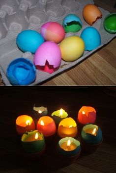 an egg carton filled with different colored eggs and lit candles next to each other