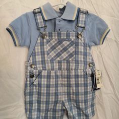 Both Items Are Blue And The Overalls Have A Plaid Print And The Shirt Is Just Solid Blue. It’s Size 9-12 Months. Made From 100% Cotton. It’s New With Tags And Has Never Been Worn. American Flag Kids, Girls Cardigan Sweater, Argyle Sweater Vest, Koala Kids, Girls Cardigan, Argyle Sweater, Boy Tees, Girls Jacket, Kids Sweater