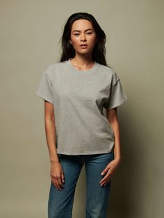 The classic crewneck you've been looking for is here, featuring a ribbed neckline, short sleeves and drop shoulders for the ultimate off-duty vibe. (This one comes in Heather Grey.) | Women's Jessa Short Sleeve Top in Heather Grey | Ethical Essentials Relaxed Crew Neck Top For Casual Gatherings, Effortless Crew Neck T-shirt For Casual Gatherings, Short Sleeve T-shirt With Ribbed Neckline For Loungewear, Effortless Everyday Crew Neck Tops, Boxy Solid Color Crew Neck Top, Boxy Fit Cotton Short Sleeve Top For Everyday, Everyday Boxy Fit Short Sleeve Cotton Top, Boxy Cotton Short Sleeve Crew Neck Top, Relaxed Crew Neck Short Sleeve Top For Everyday