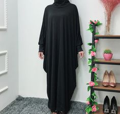 Description Details: Details: Without Hijab Fabric: Polyester Pattern: Solid Color Occasion: Casual Season: Spring Fitness: Regular Collar Type: Round Neck Sleeve Length: Long Sleeve Length: 141CM weight：0.7kg Modest Black Abaya With Long Sleeves, Modest Black Long Sleeve Abaya, Modest Long Sleeve Black Abaya, Black Long Khimar For Eid, Black Long Sleeve Hijab For Eid, Modest Black Long Sleeve Khimar, Modest Long Sleeve Black Khimar, Long Sleeve Black Khimar For Eid, Black Long Sleeve Khimar For Eid