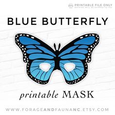 the blue butterfly printable mask is shown against a white brick wall with text that reads,'blue butterfly printable mask '