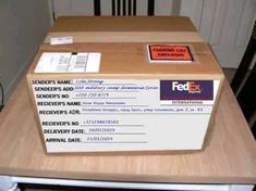 a fed ex box sitting on top of a table