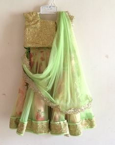 Spring Anarkali Set With Gota Work, Designer Pista Green Choli With Sequins, Pista Green Sequined Choli For Designer Wear, Designer Pista Green Sequined Choli, Spring Festive Sharara With Gota Work, Green Traditional Drape Dress For Spring, Pista Green Sequin Sets For Reception, Green Spring Dress With Traditional Drape, Pista Green Floor-length Sequin Set