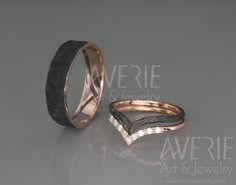 two wedding rings with diamonds on them sitting next to each other in front of a gray background